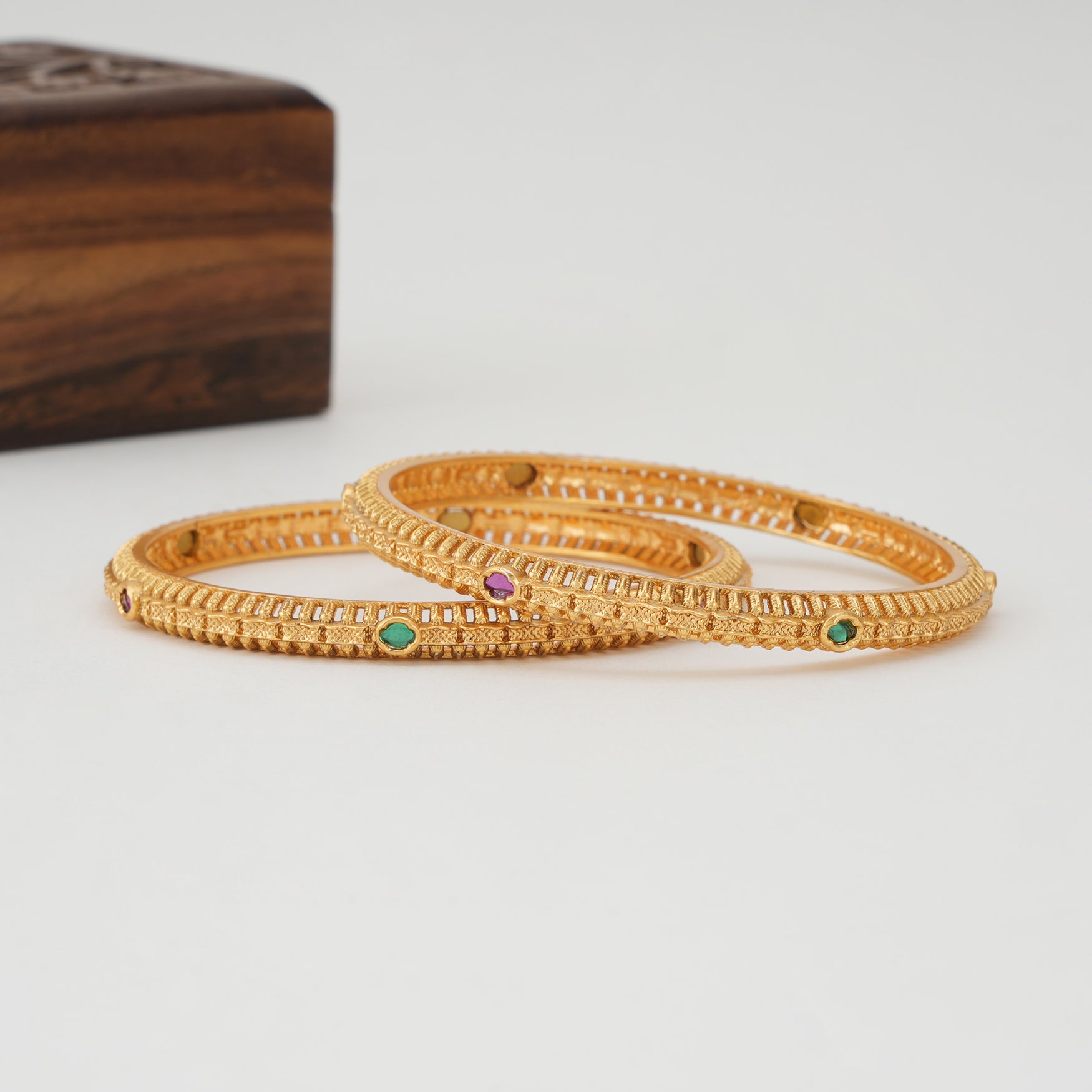 Beautiful stone sleek gold bangle set