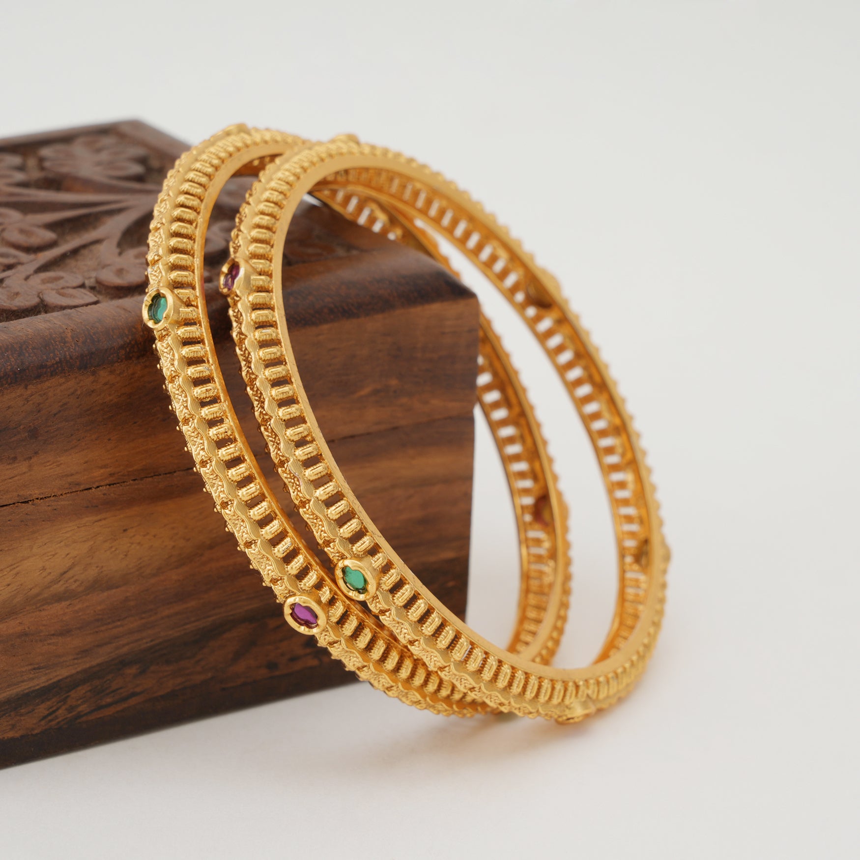 Beautiful stone sleek gold bangle set