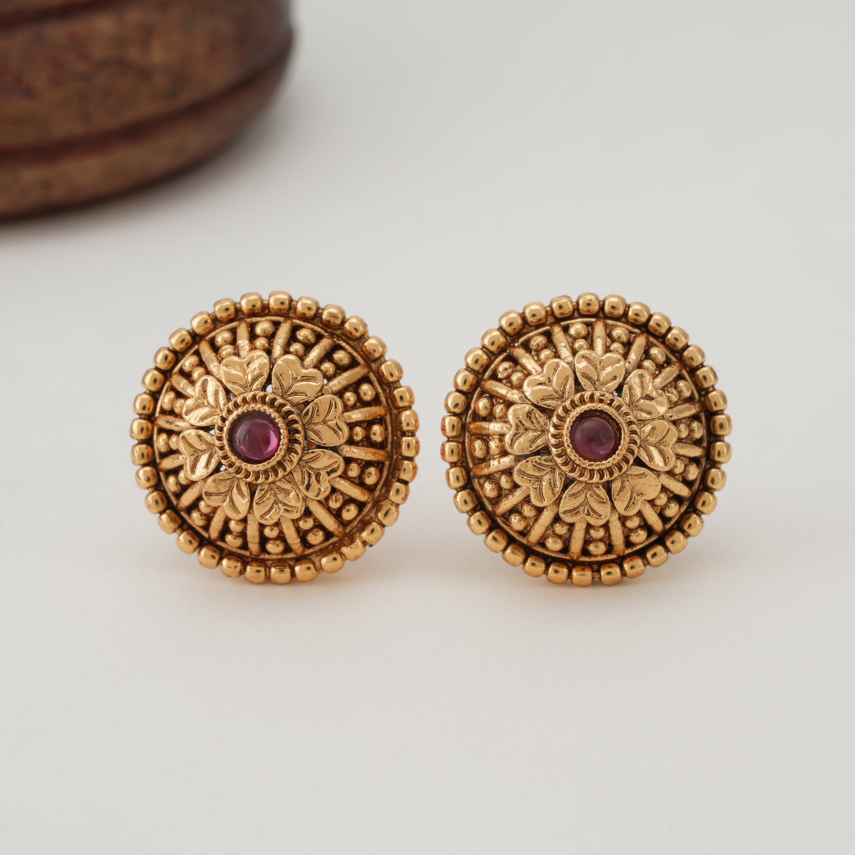 Elegant floral ruby gold stud earring