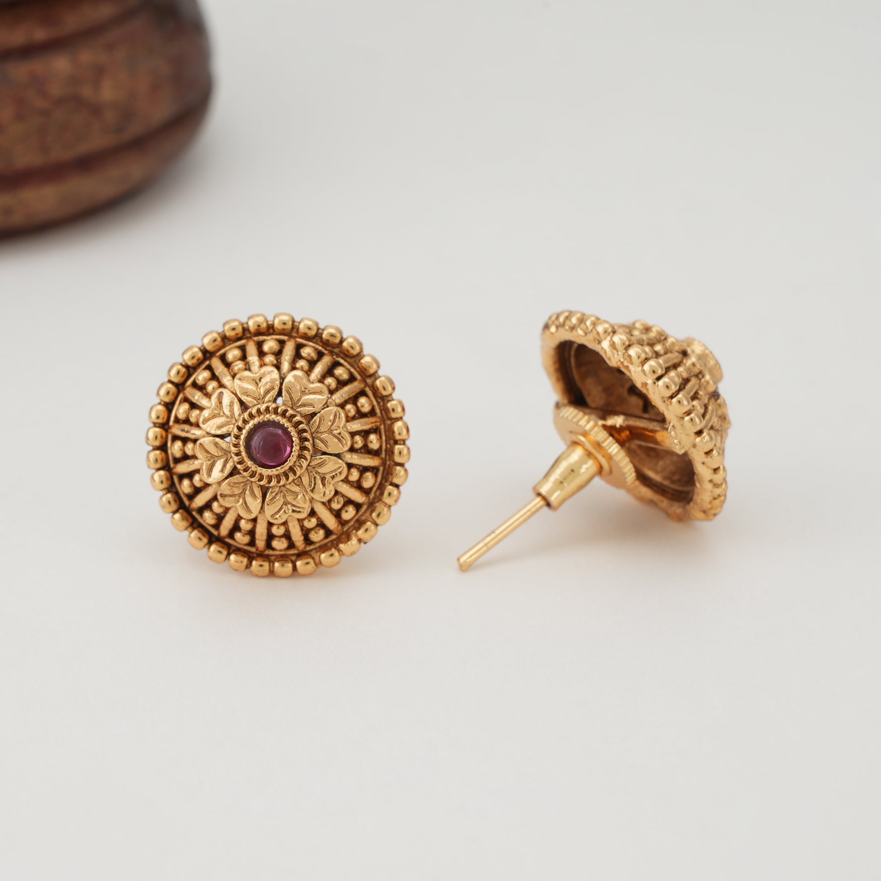 Elegant floral ruby gold stud earring