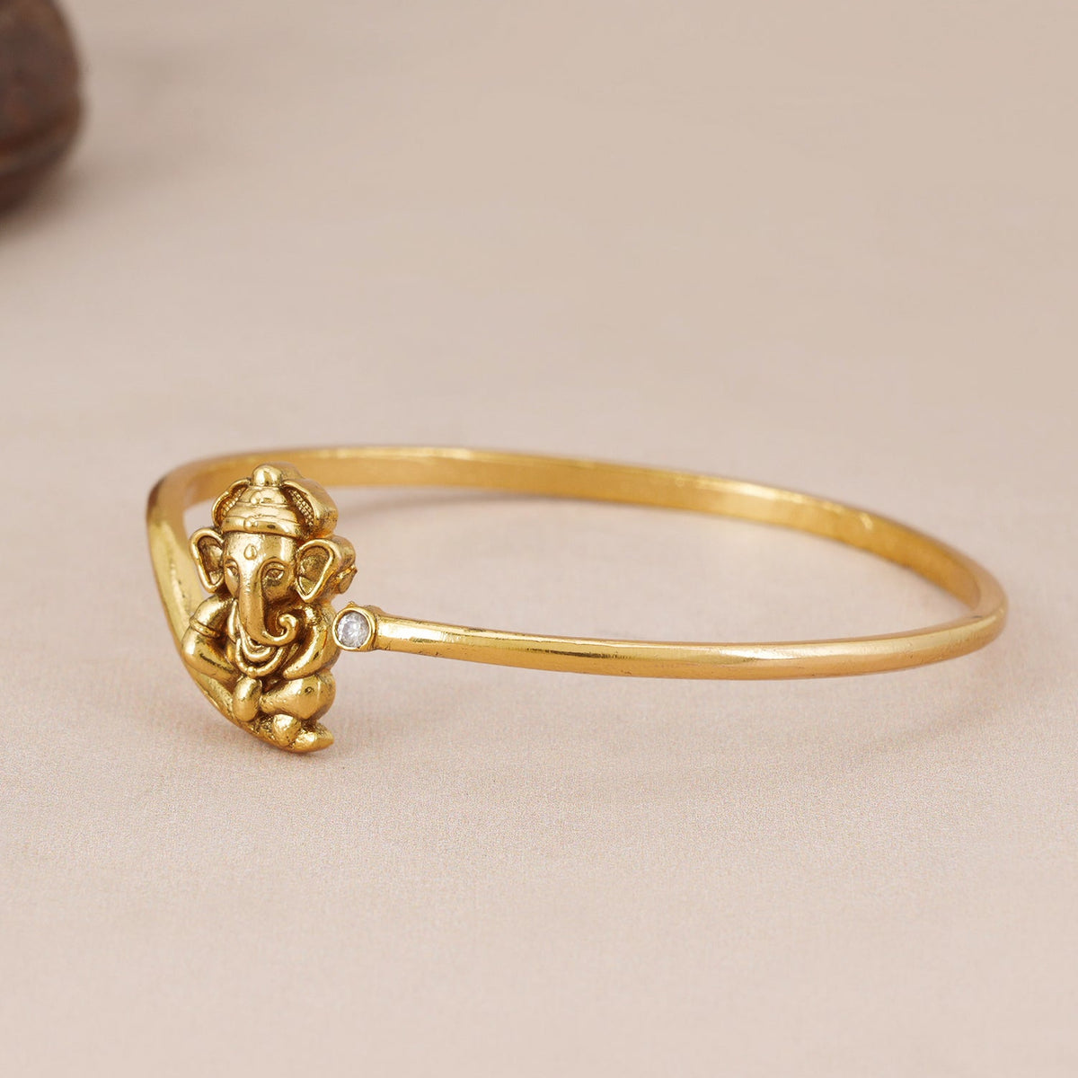 Stunning antique gold flexible ganesh kada
