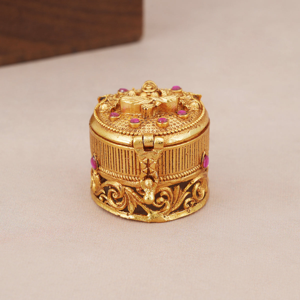 Beautiful small antique gold ganesh sindoor box