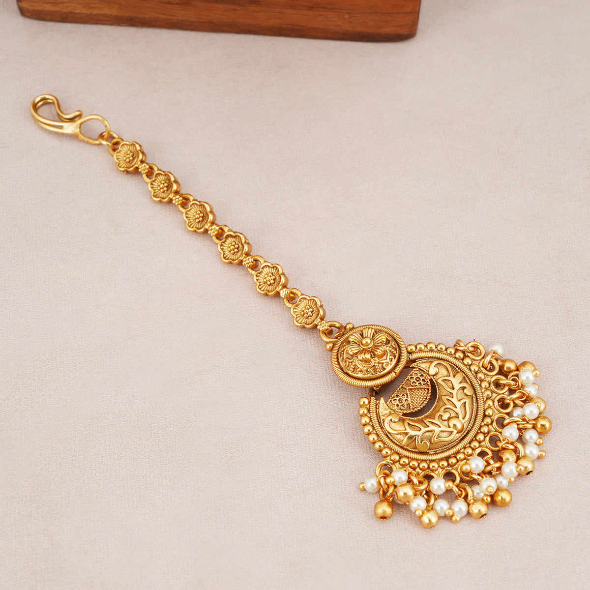 Beautiful antique gold pearl drop maangtika