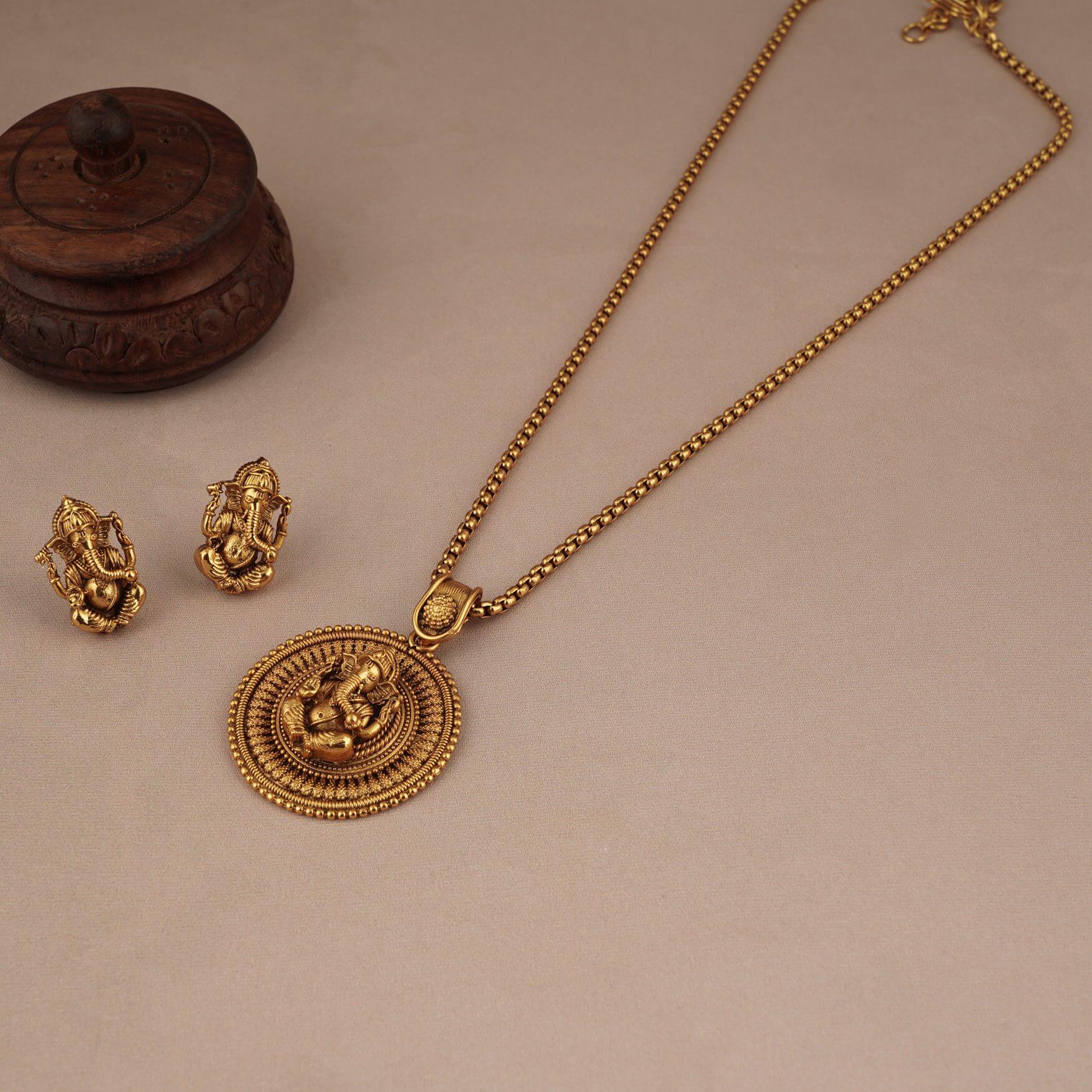 Beautiful gold plated ganesh pendant set with earring | Temple Jewellery