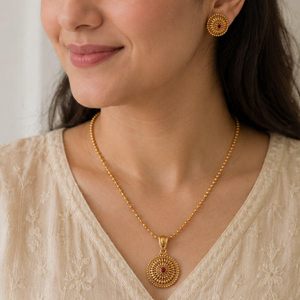 Cute gold finish floral ruby stone pendant set