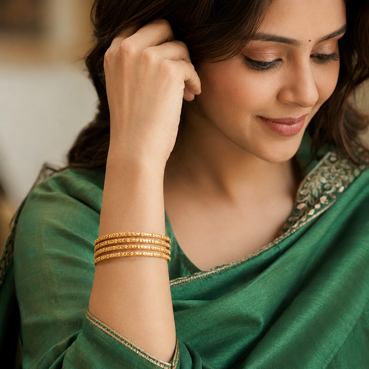 Plain sleek gold bangle set (set of 4)