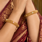 Beautiful intricate plain gold bangle set