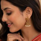 Beautiful pearl drop gold jhumka earring