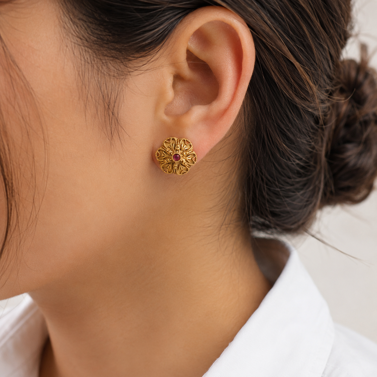Floral stone stud gold plated earring