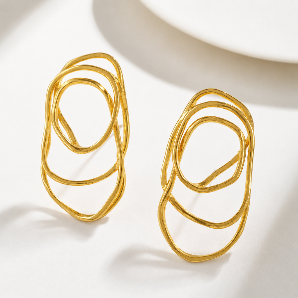 Stunning spiral demi fine gold earring