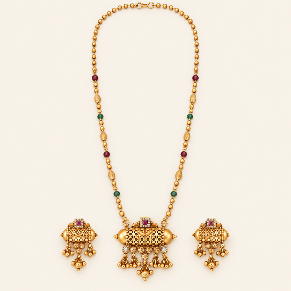 Long elegant stone antique gold pendant set
