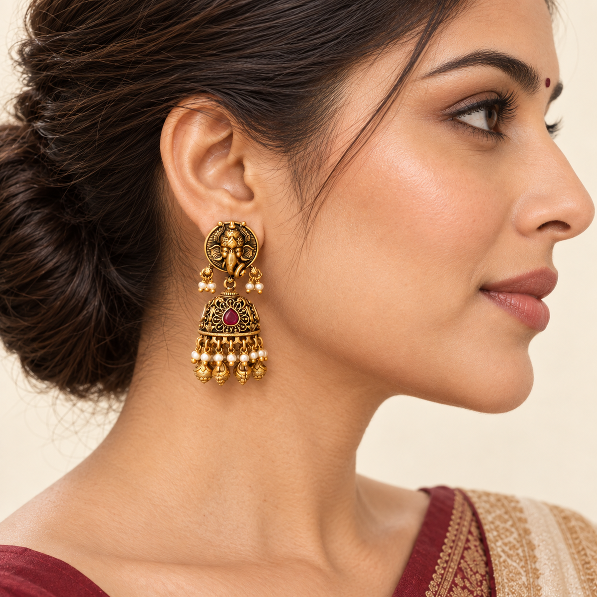 Lord Ganesh gold ruby jhumka earring