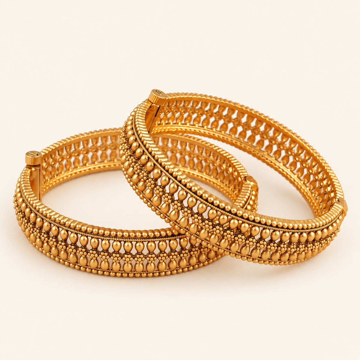 Broad gold plated bangle set