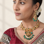 Stunning gold plated green stone kundan Maa Lakshmi necklace set