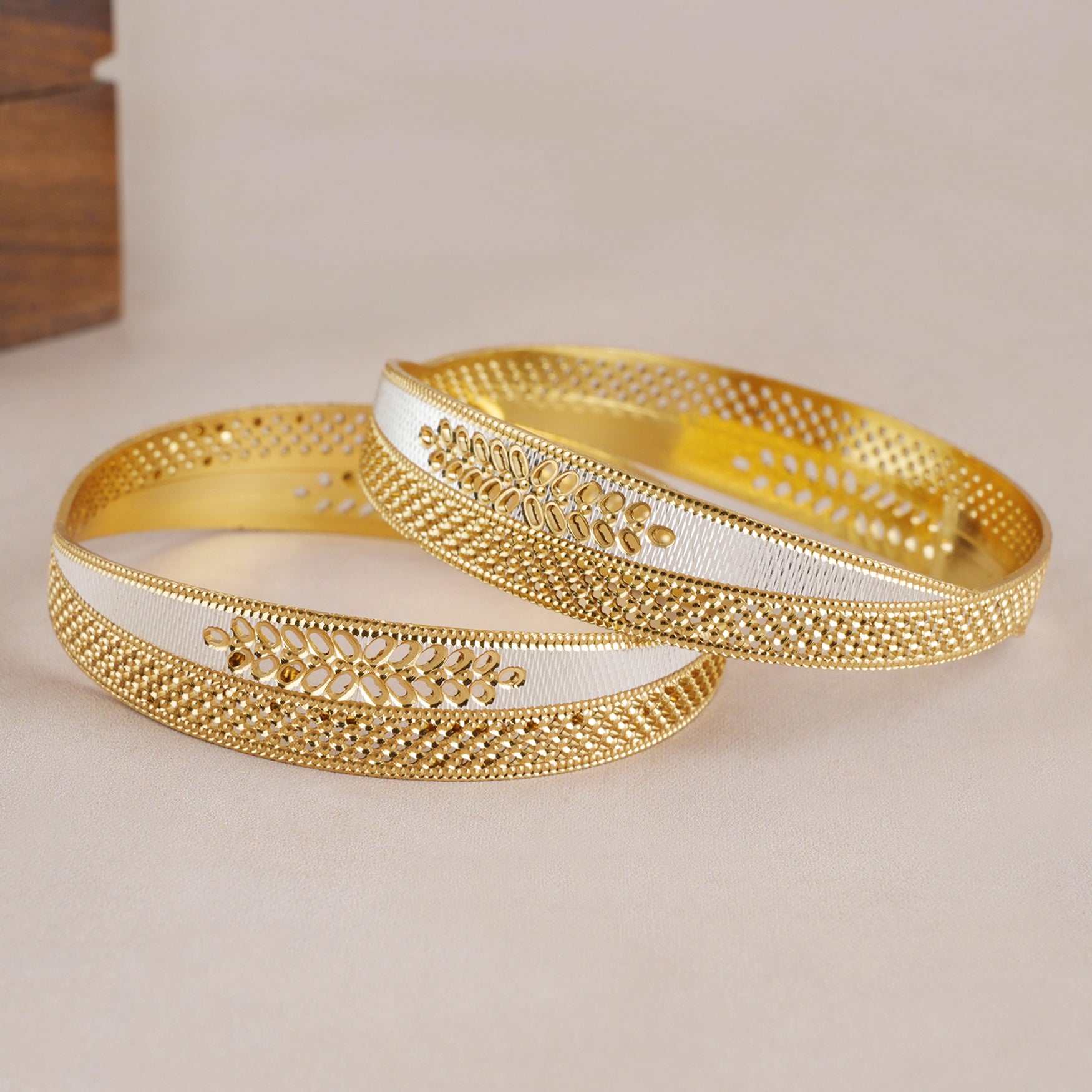 Broad dual tone gold plated bangle set