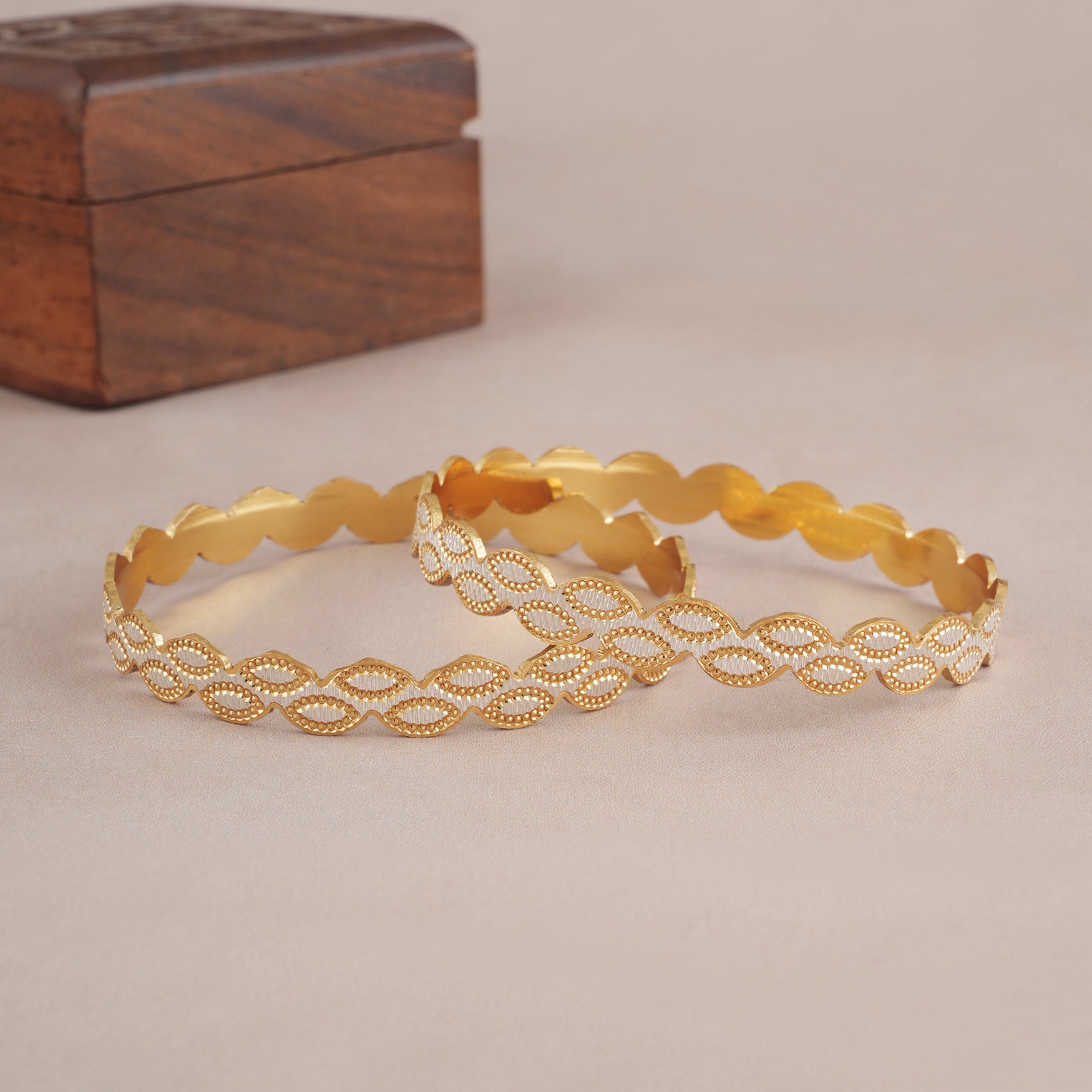 Gold plated pear shape dual tone bangle set