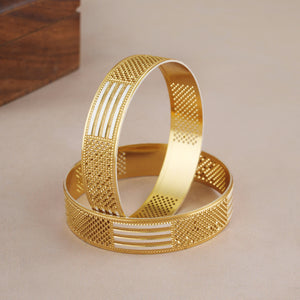 Bold dual tone gold bangle set