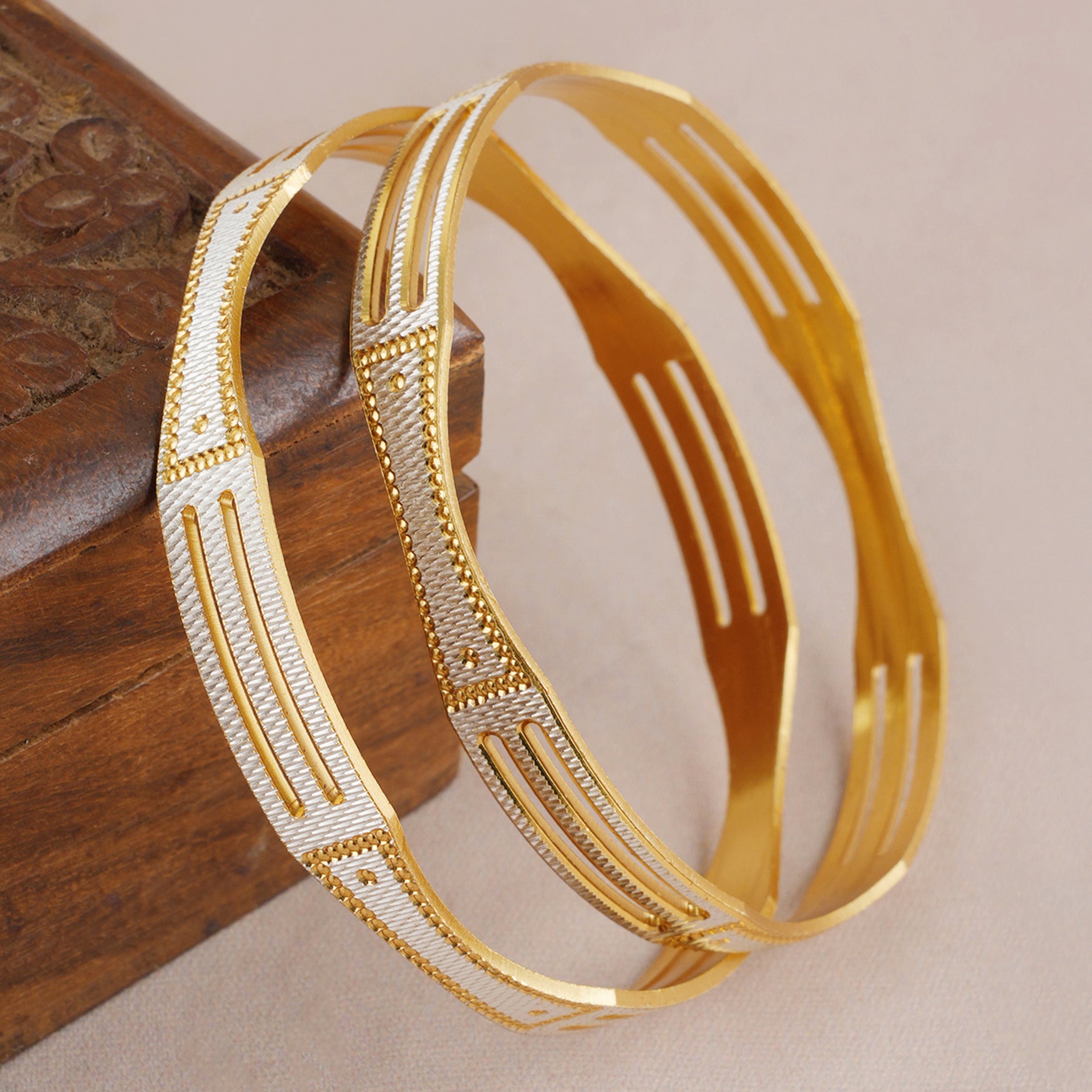 Stunning dual tone gold plated bangle set