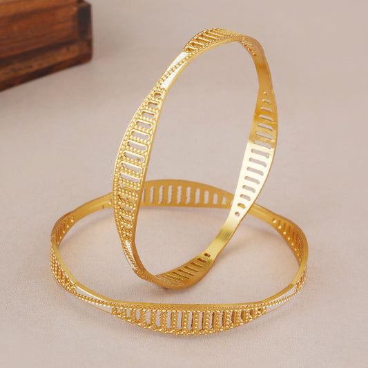 Spiral dual tone gold plated bangle set