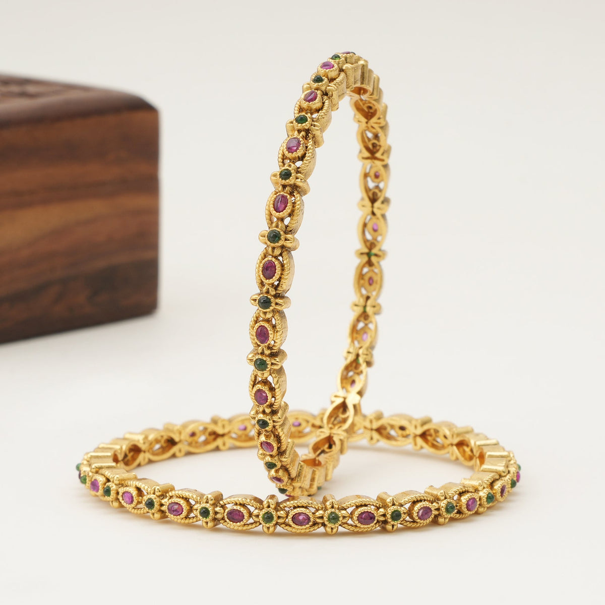 Sleek antique gold stone bangle set