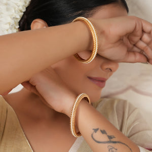 Elegant pearl line gold plated bangle set