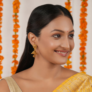 Beautiful plain antique gold jhumka earring