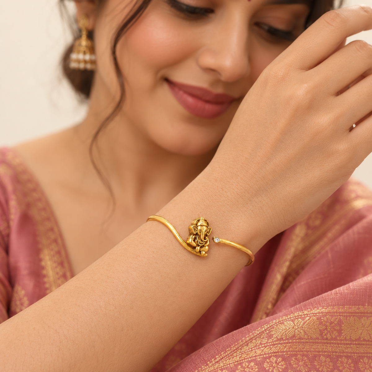 Stunning antique gold flexible ganesh kada