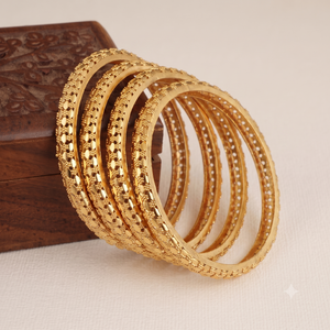 Beautiful antique gold plated bangle set for women ( set of 4 )
