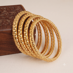 Beautiful antique gold plated bangle set for women ( set of 4 )