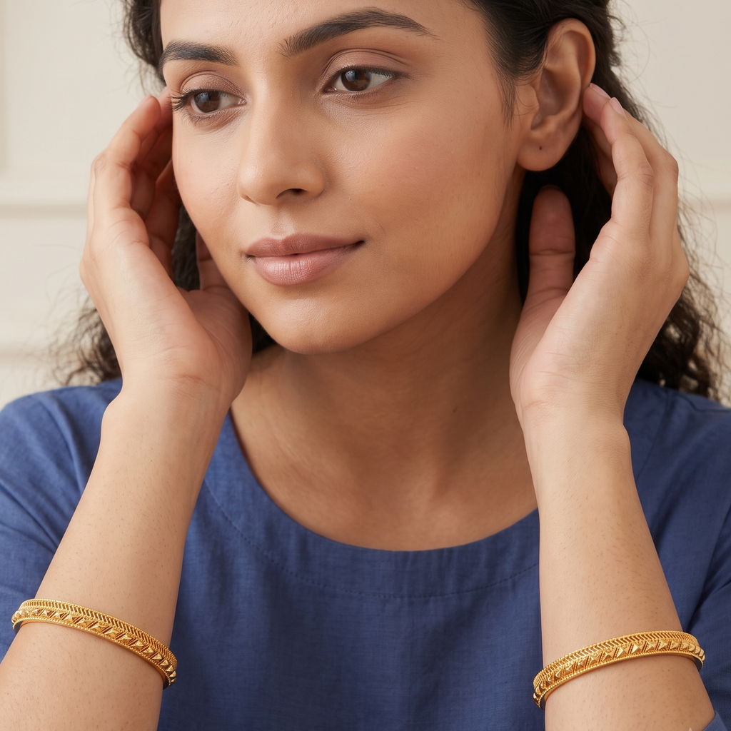 Sleek plain gold bangle set