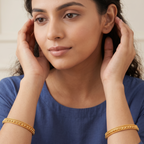 Sleek plain gold bangle set