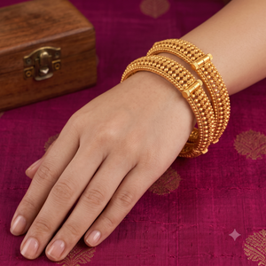 Broad gold plated bangle set