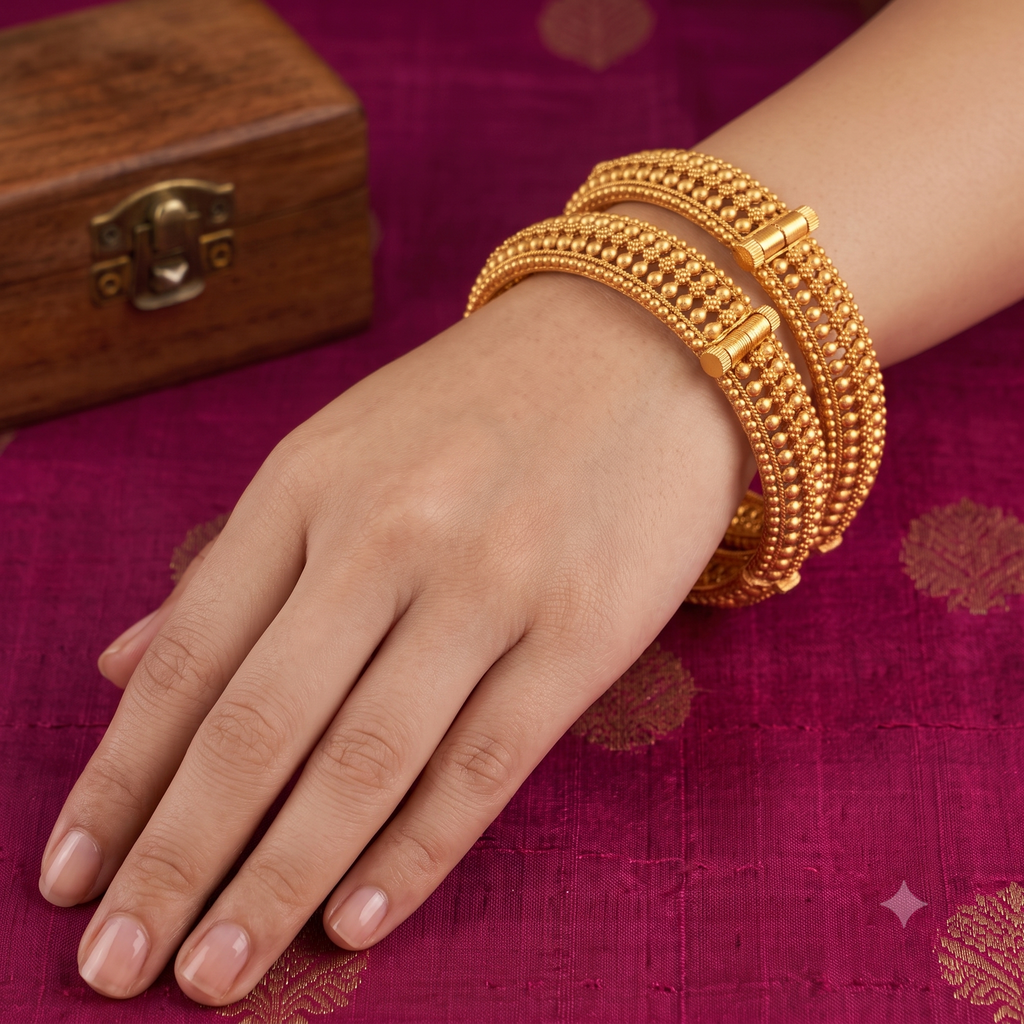 Broad gold plated bangle set
