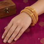 Broad gold plated bangle set