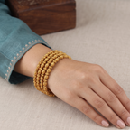 Sleek elegant antique gold plain bangle set (set of 4)