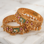 Stunning broad antique gold stone bangle set