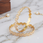 Gold plated pear shape dual tone bangle set