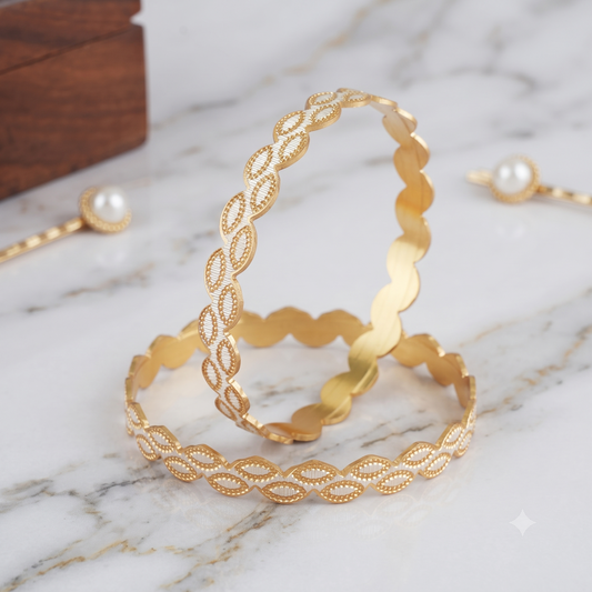 Gold plated pear shape dual tone bangle set