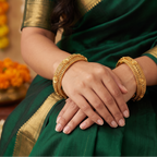 Beautiful intricate broad gold bangle set