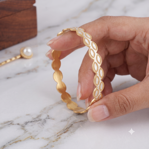 Gold plated pear shape dual tone bangle set