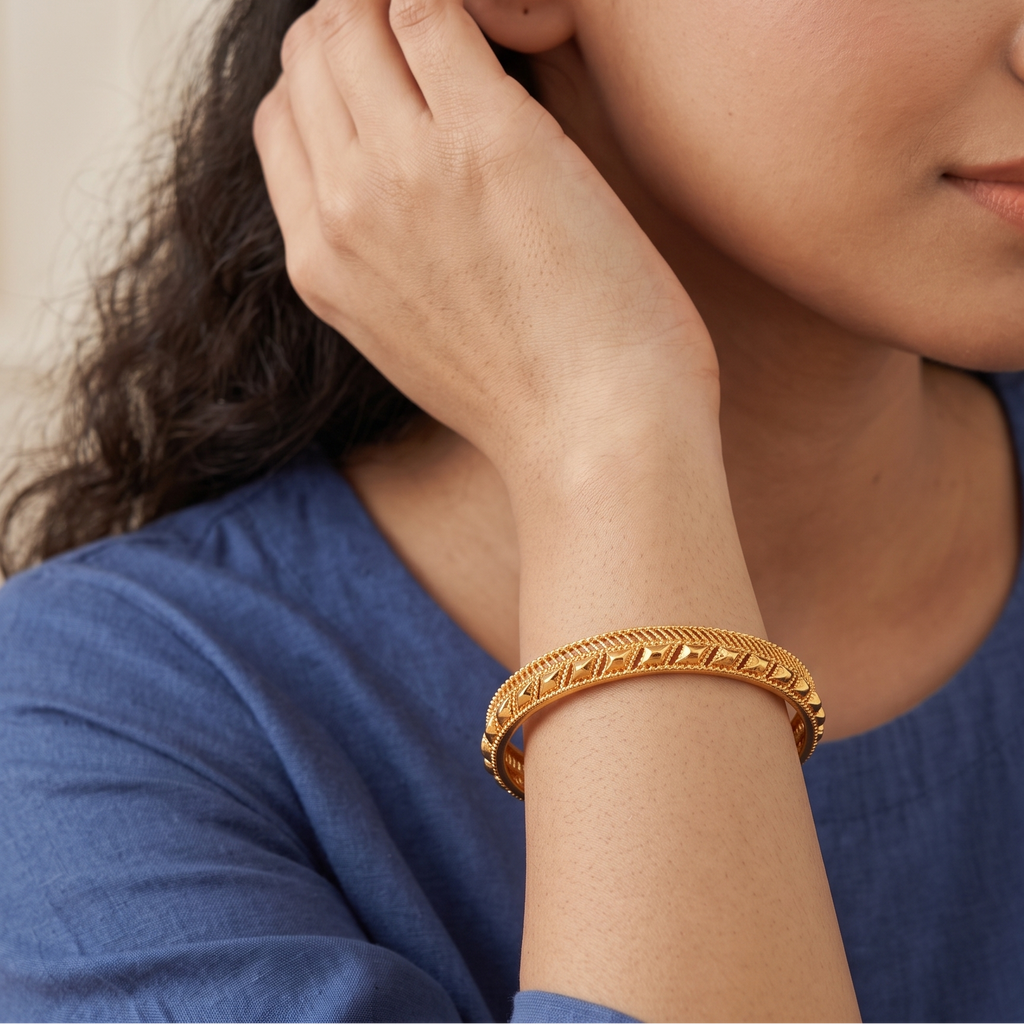 Sleek plain gold bangle set