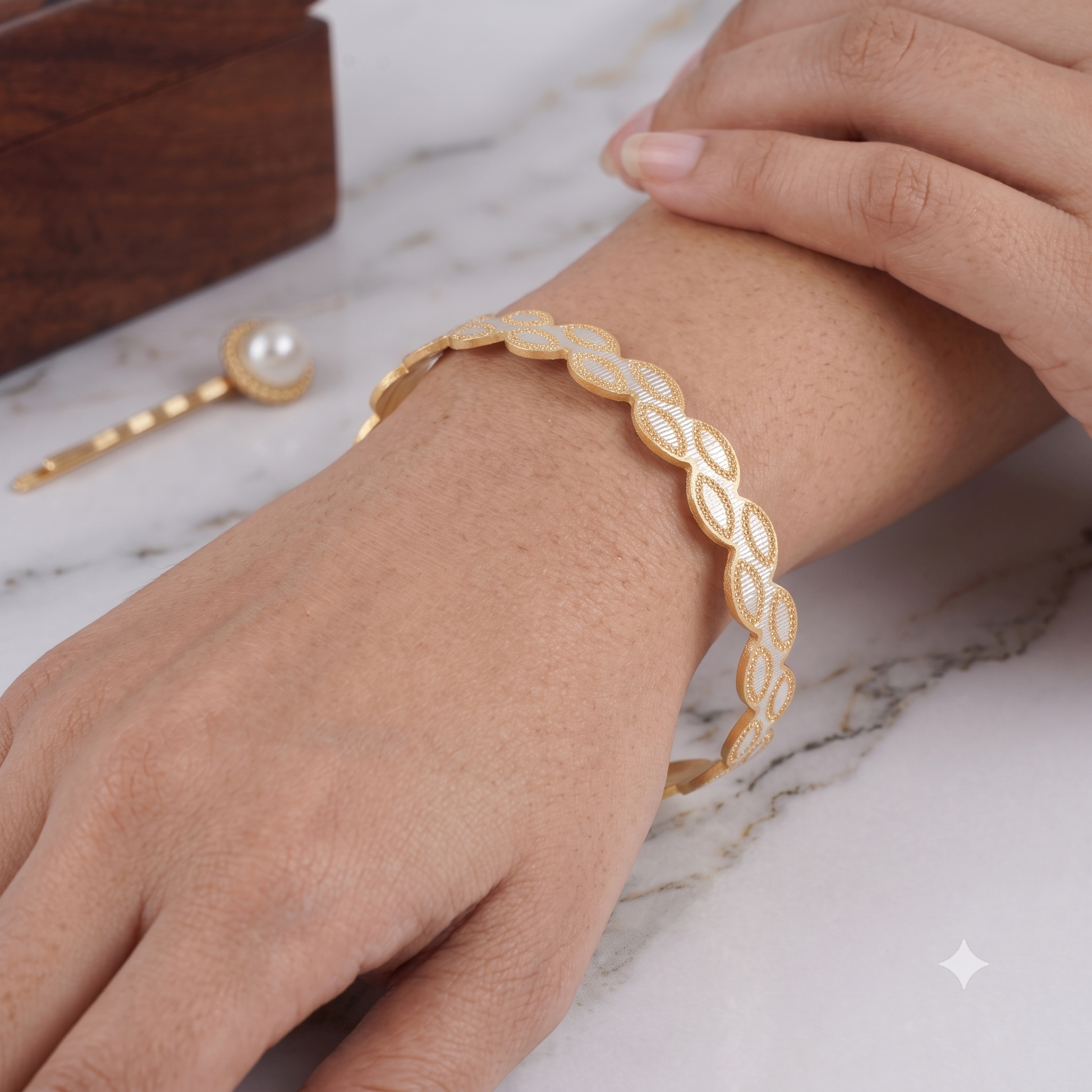 Gold plated pear shape dual tone bangle set