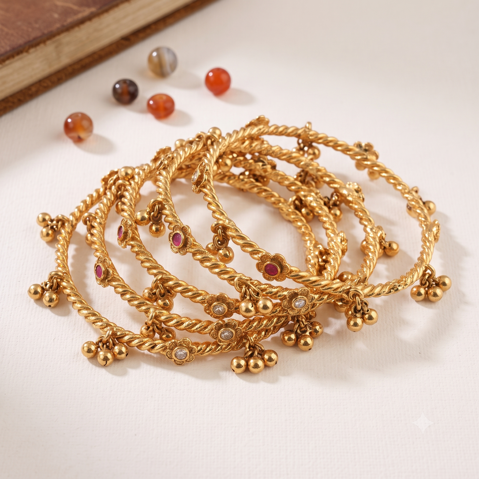 Beautiful antique gold stone ghungroo bangle set ( set of 4 )