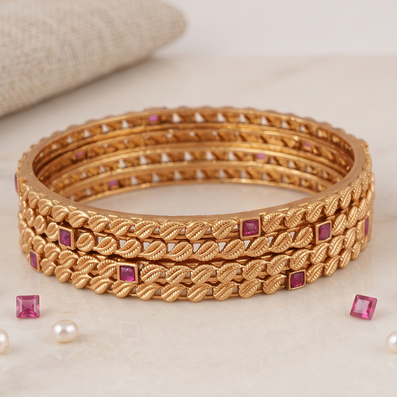Sleek antique gold ruby stone bangle set