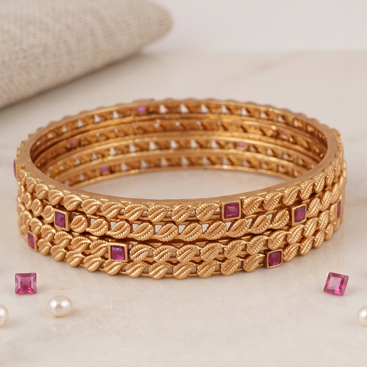 Sleek antique gold ruby stone bangle set