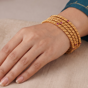 Sleek antique gold ruby stone bangle set