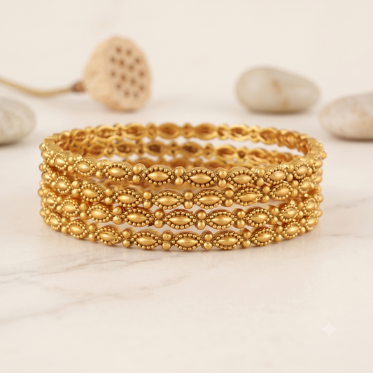 Sleek elegant antique gold plain bangle set (set of 4)